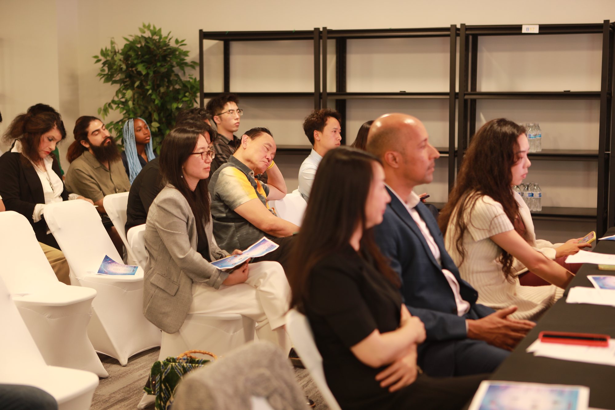 Audience members participating in a Hanbridge event
