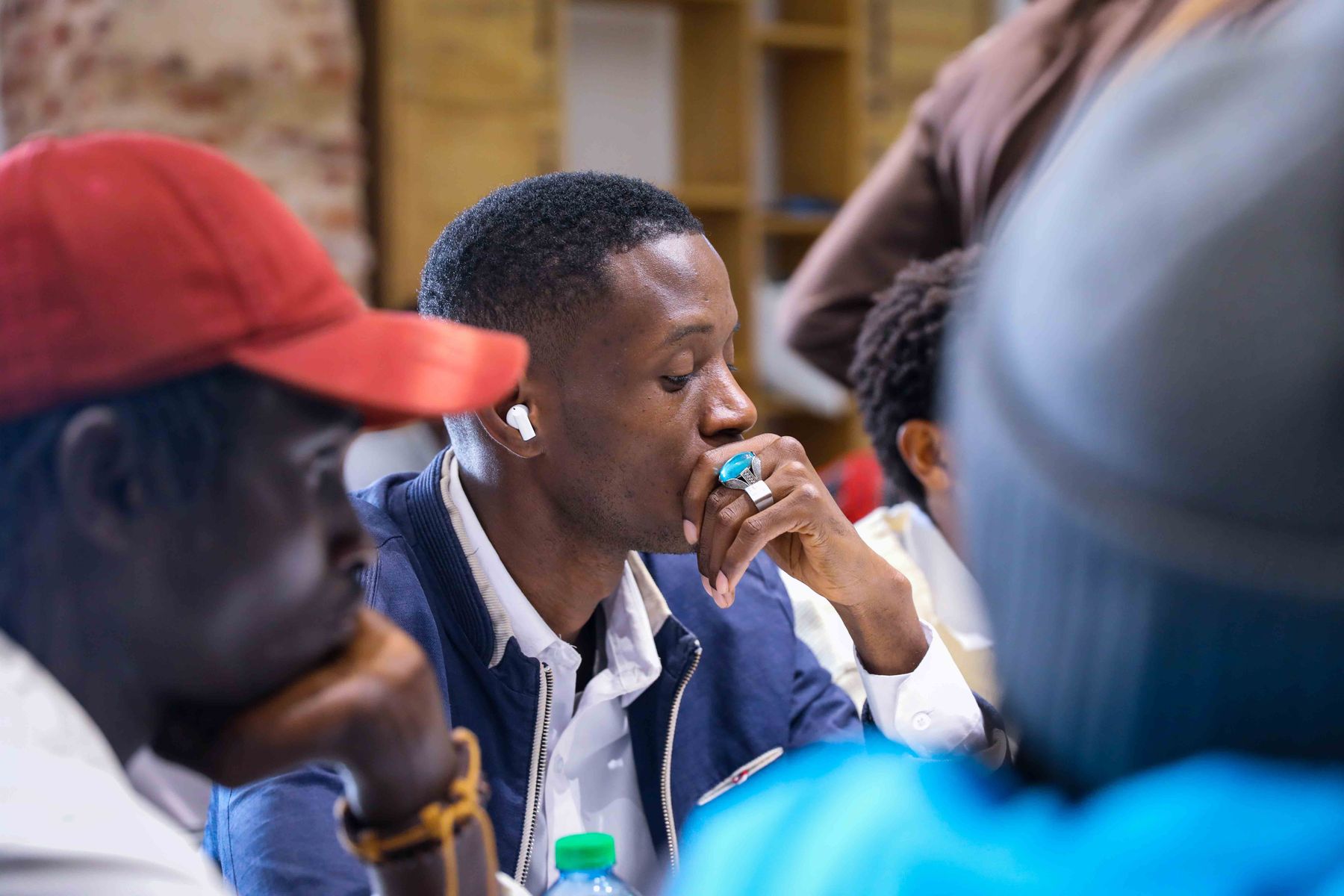 Participants listening during a focused group discussion